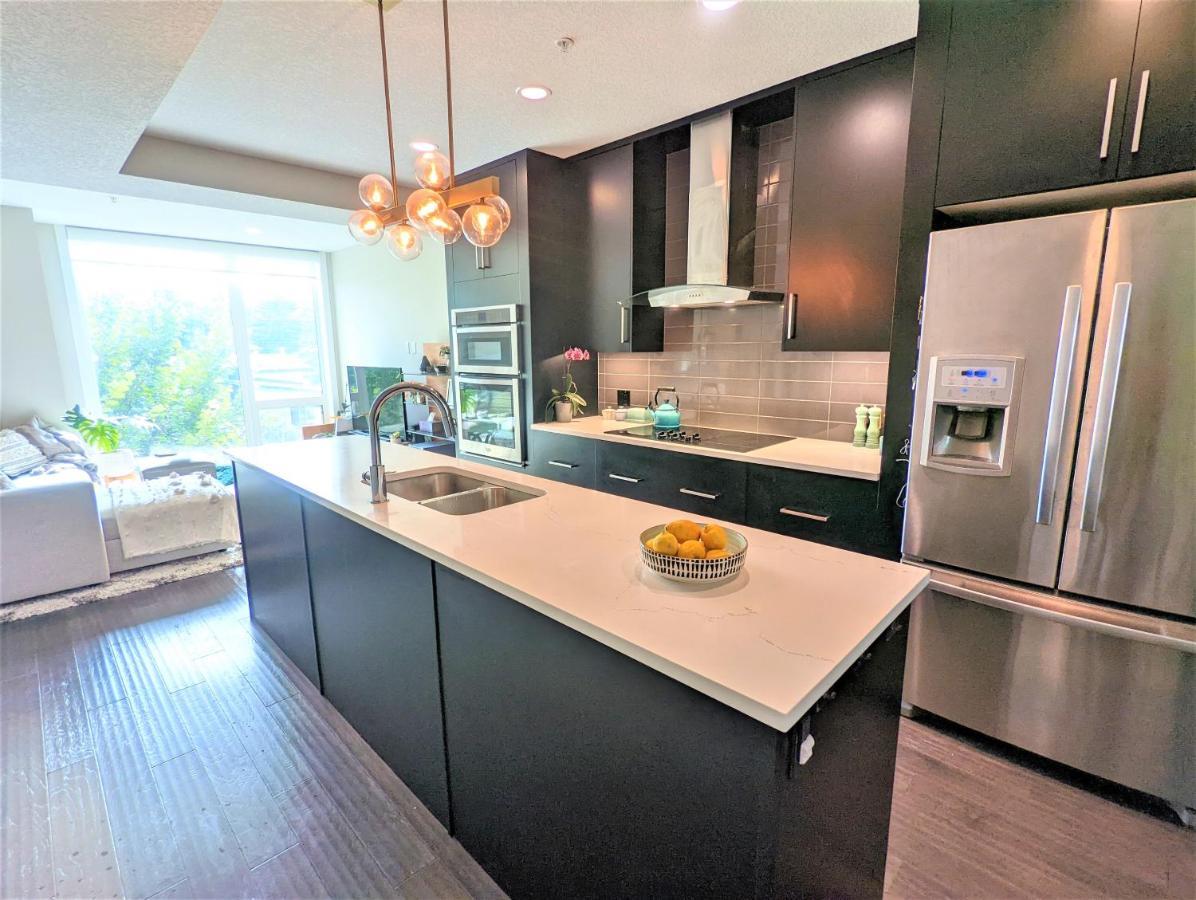 YYC Monki Di Executive Suites - Glas - Luxury Inner City Home 3 Min To Downtown W Private Rooftop Patio Fireplace מראה חיצוני תמונה